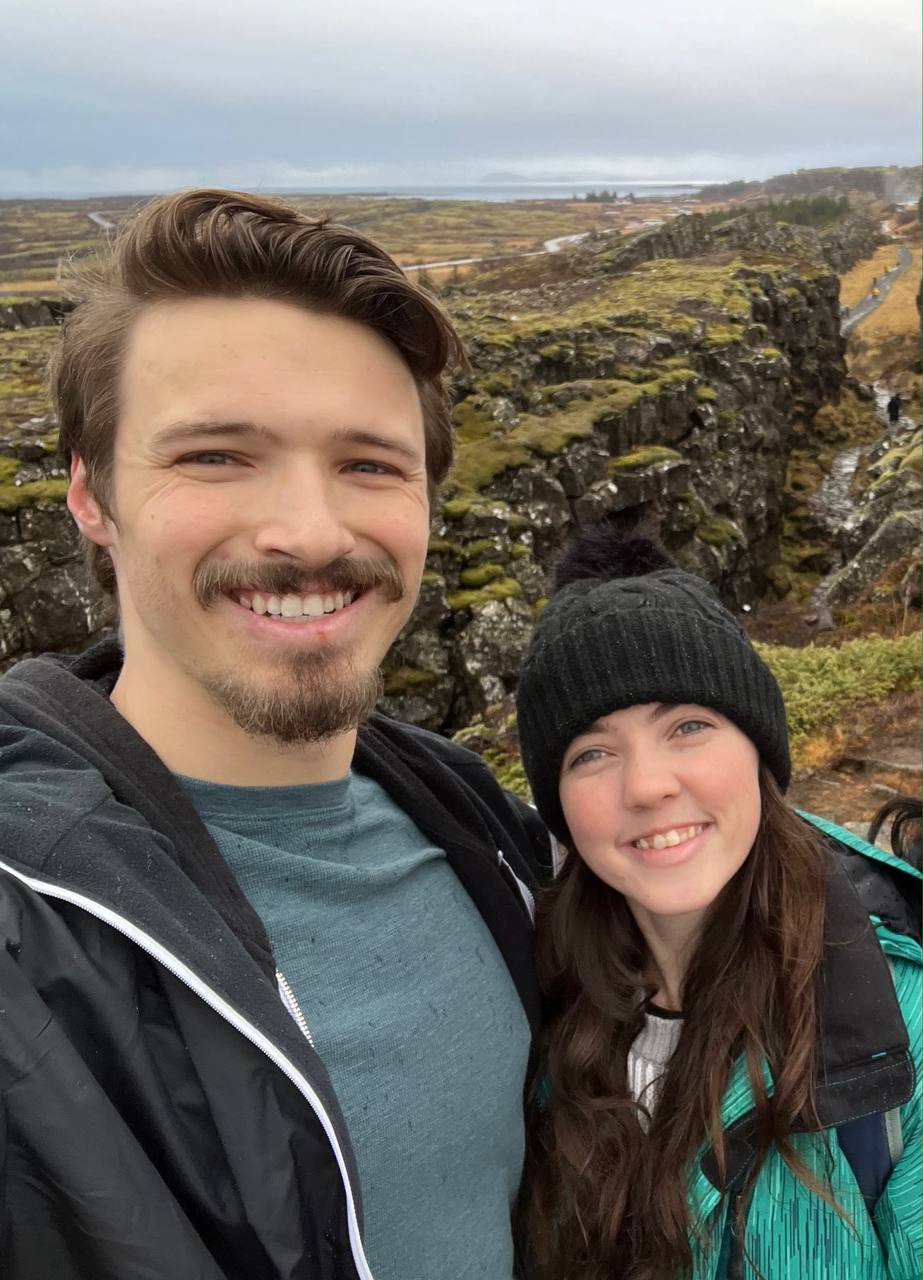 Christina and Benjamin overlooking a scenic landscape